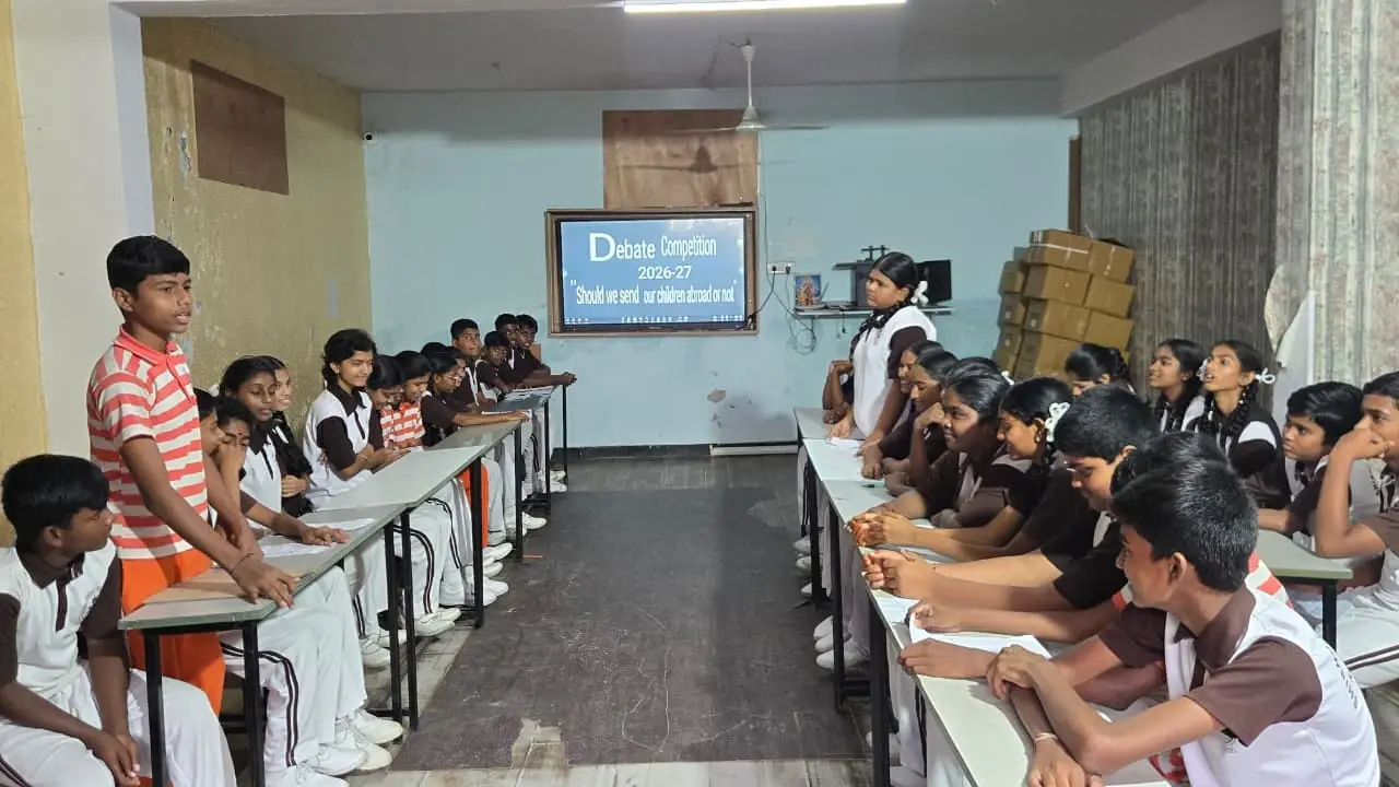 Students taking part in a classroom debate competition