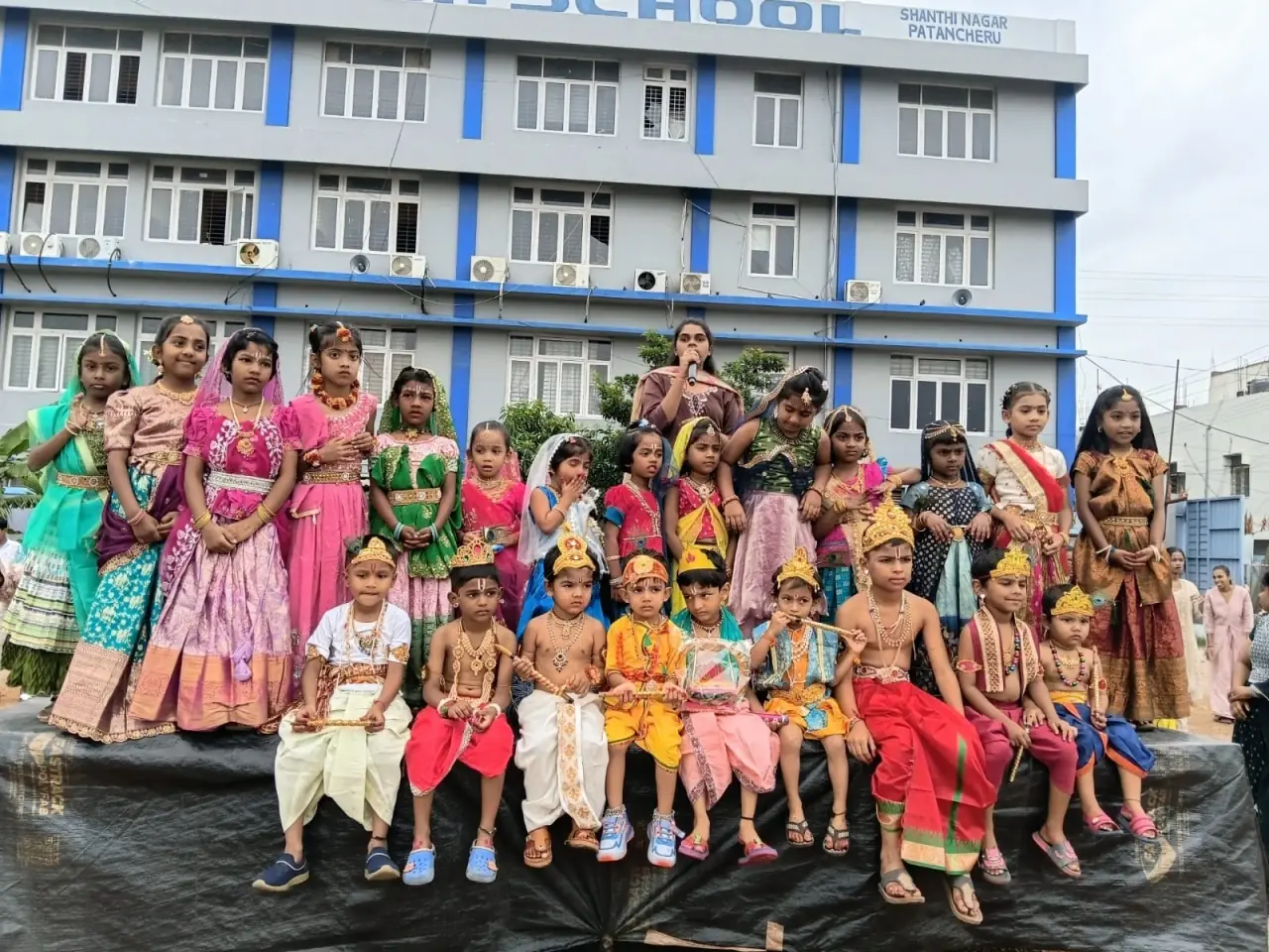Young students dressed as Krishna and Radha